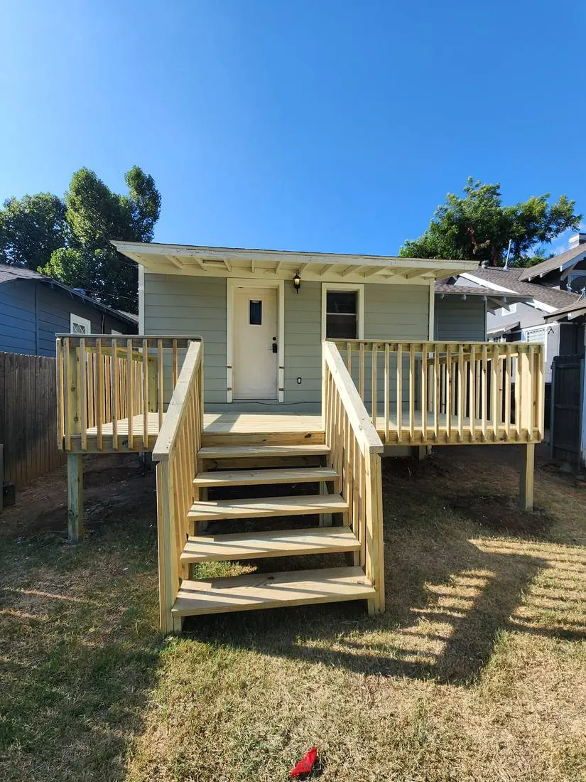 New deck with stairs and ramp access